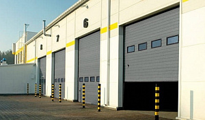 Промышленные секционные ворота серого цвета