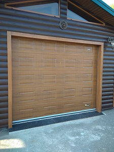 Секционные ворота: технические характеристики, конструкция и особенности применения